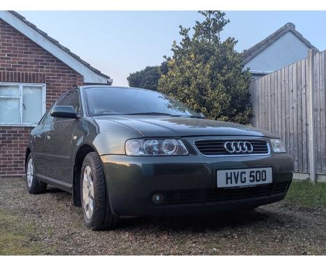 An Audi A3 1.8 litre petrol engine hatchback car, 2003, 12,033 miles, having green metallic paint, five doors, cream leather 