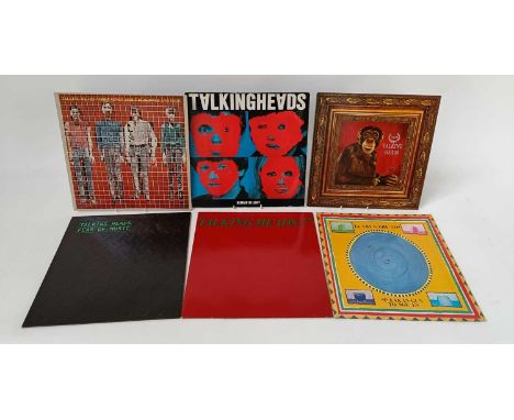 A collection of six Talking Heads records: Speaking in Tongues, 77, More Songs About Buildings and Food, Fear of Music, Naked