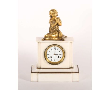 A 19th century white marble mantel clock, surmounted by a gilt bronze figure of a girl, height 35cm, together with the Intern