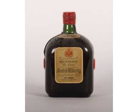 A bottle of Buchanan's "De Luxe" blended scotch whisky