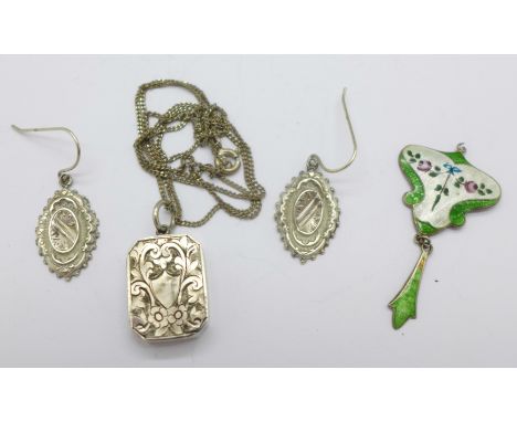 A silver and enamel pendant, Birmingham 1915, a pair of Victorian hallmarked silver earrings and a Victorian silver locket on