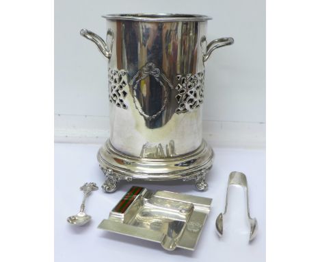 A Garrard & Co. silver and enamel ashtray, bears golf tournament inscription, a silver spoon, a pair of plated sugar bows and