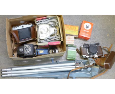 A collection of cameras, including Agfa and Fujica, tripod, light meter, etc.