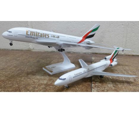 Two model Emirates airliners