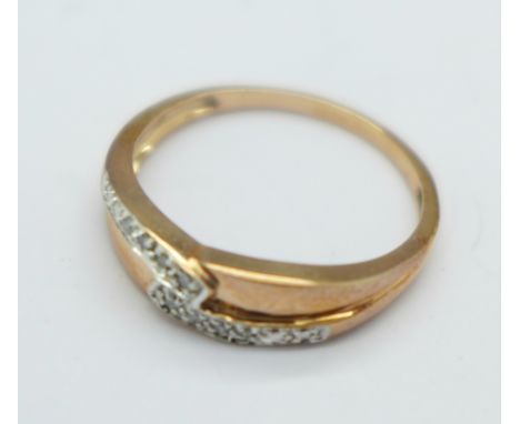 A 9ct gold and diamond ring, 2g, P