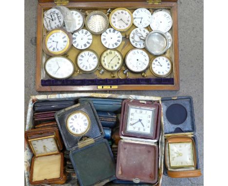A collection of travel watch/clock movements including Mappin, Smith's, 8 days, travel clocks, travel clock cases
