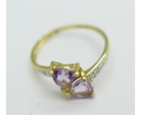 A 9ct gold, amethyst and diamond ring, 1.3g, O