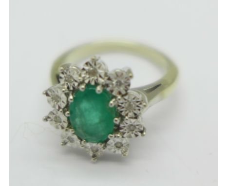 A 9ct gold, emerald and illusion set diamond cluster ring, 4.6g, K