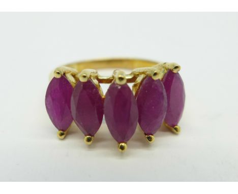 A 14ct gold and five stone ruby ring, 4.3g, N