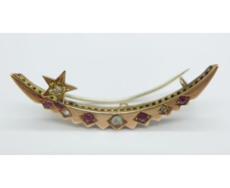 A ruby and diamond set crescent brooch
