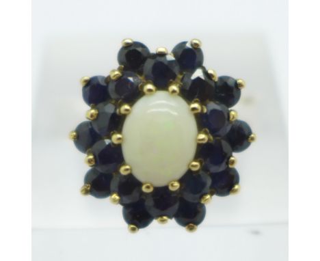 A 9ct gold, opal and sapphire cluster ring, 4.5g, N