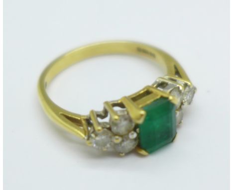 An 18ct gold, emerald and diamond ring, 3.3g, M