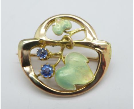 A yellow metal, enamel and sapphire Art Nouveau brooch