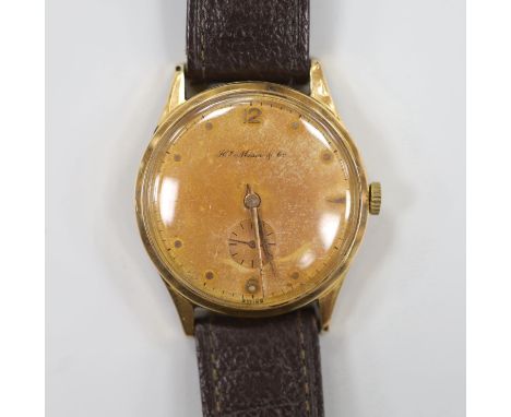 A gentleman's 1950's? 18k manual wind wrist watch, retailed by H. Moser &amp; Cie, with subsidiary seconds, case diameter 36m