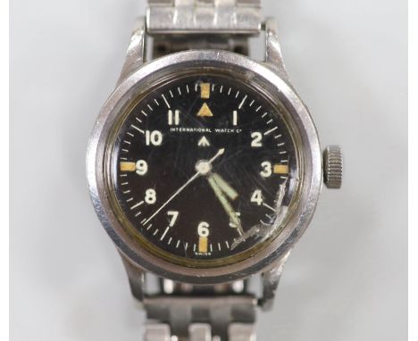 A gentleman's late 1940's steel military issue International Watch Co. manual wind black dial wrist watch, with Arabic dial w