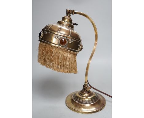 An adjustable Arts and Crafts brass and ‘jewelled’ table lamp, 34cm