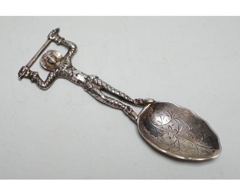 An early Victorian novelty silver caddy? spoon, with figural stem, Susanna Cook, London, 1845, 11.6cm.