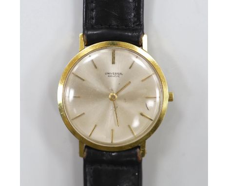 A gentleman's 18ct gold Universal manual wind wrist watch, with baton numerals, on a leather strap with gold plated Universal