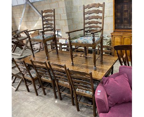 An 18th century style rectangular oak refectory dining table, length 210cm, depth 92cm, height 76cm together with a set of te