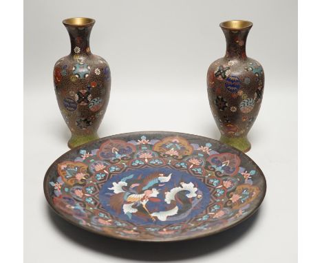 A Japanese cloisonné enamel dish, 30.5cm diameter and a pair of Japanese cloisonné enamel vases. (3)