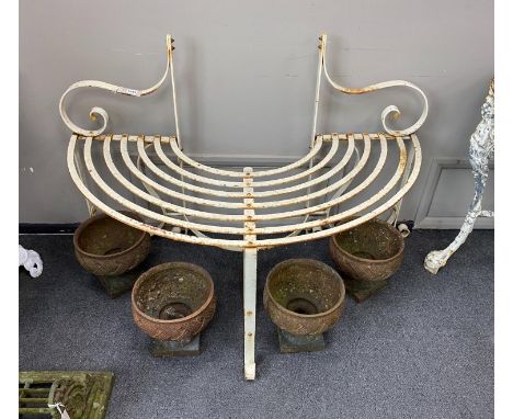 A painted wrought iron garden tree seat, width 120cm, depth 60cm