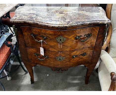 A small 19th century French transitional style gilt metal mounted kingwood marble topped two drawer serpentine commode, width