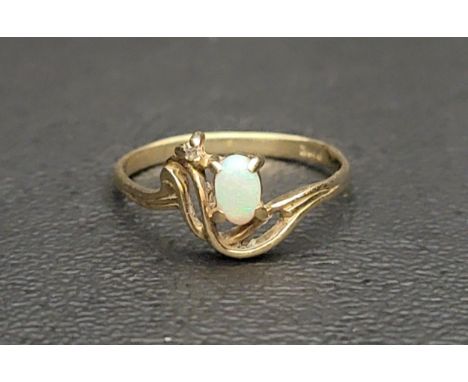 PRETTY OPAL AND DIAMOND RINGthe oval cabochon opal and small diamond in scrolling Art Nouveau style setting, on ten carat gol