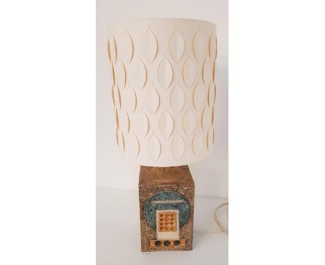 TROIKA POTTERY LAMP BASEby Louise Jinks, with moulded geometric patterns to two sides, with a paper patterned shade, 48.5cm h