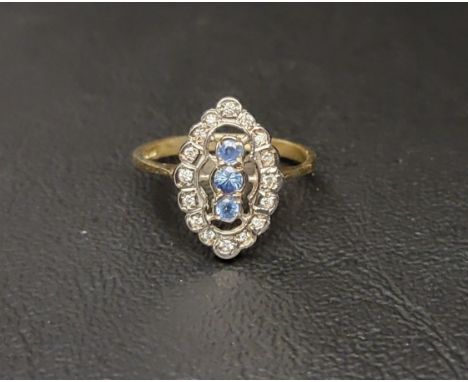 ART DECO STYLE SAPPHIRE AND DIAMOND PLAQUE RINGthe central three vertically set sapphires in a marquise shaped diamond halo, 