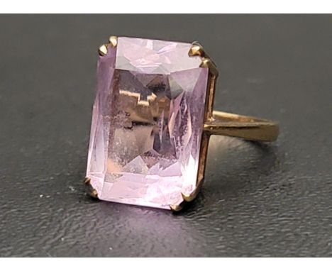 LARGE AMETHYST SINGLE STONE RINGthe radiant cut amethyst gemstone measuring approximately 17.9mm x 12.8mm x 8.1mm, on nine ca