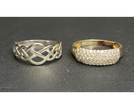 FOURTEEN CARAT GOLD STONE SET RINGwith a nine carat white gold ring of a Celtic knot motif, ring size O and approximately 1.8