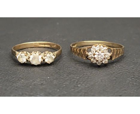 TWO CZ RINGScomprising a three stone example and a small cluster ring, both on nine carat gold shanks, ring sizes L and O-P r