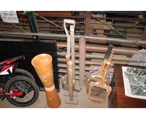 Three sledge hammers and a shovel