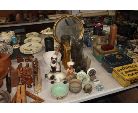 A quantity of various decorative items including porcelain models of cats, a pestle &amp; mortar, coloured glass drinking set