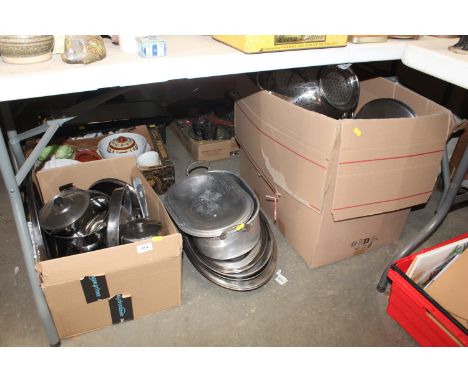 A collection of various stainless steel kitchenalia including pots, trays etc
