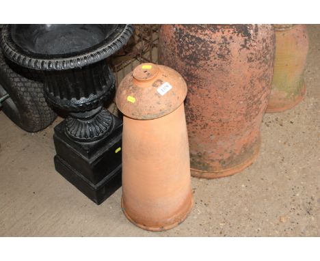 A terracotta rhubarb forcer