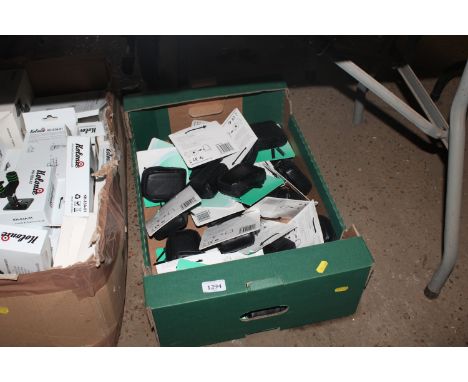 A box containing Fujifilm camera cases 