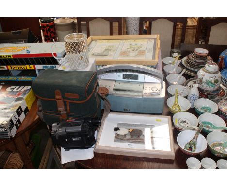 A Sony camcorder, a Miranda camera case, a JVC stereo alarm clock, a diffuser, bed tray etc