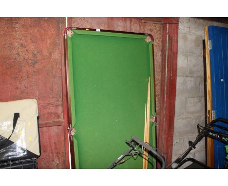 A snooker table together with various accessories