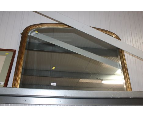 A gilt framed and bevel edged over mantel mirror