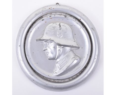 German Soldier Hero Range Plaque, interesting alloy plaque showing the profile figure of a German soldier wearing transitiona