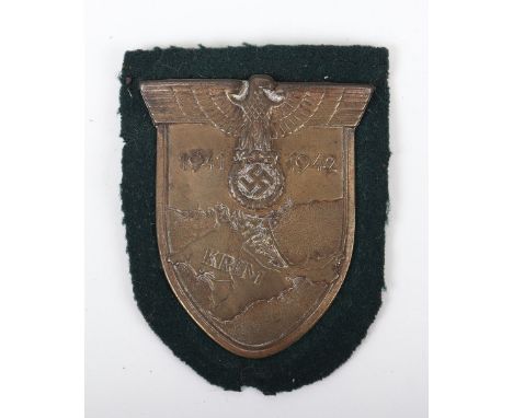 German Army (Heer) / Waffen-SS Krim Campaign Shield, bronzed campaign shield with metal backing plate, two of the four fixing