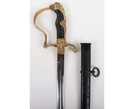 WW2 German Army Officers Sword by Clemen &amp; Jung Solingen, having a gilded lion head hilt with red jewelled eyes. Black pa