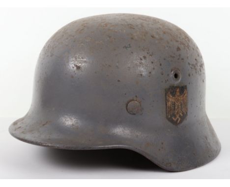 German Naval (Kriegsmarine) Shore Establishment Camouflaged Steel Combat Helmet, being a M-40 pattern shell with original Nav