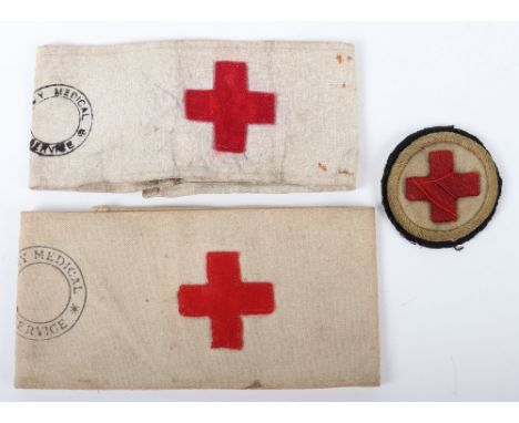 WW1 British Red Cross Insignia, including heavily embroidered Red Cross tunic arm badge and two variations of Red Cross armba