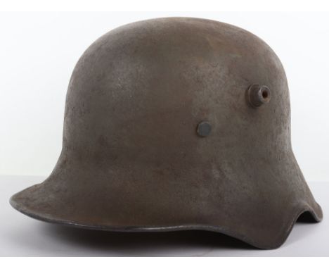 Rare Imperial German Model 1918 Ear Cut Out Steel Combat Helmet, untouched example of the scarce model German helmet from WW1