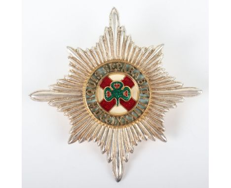 Irish Guards Pipe Majors Caubeen Headdress Badge, white metal and enamel two piece example with two lug fittings to the rever