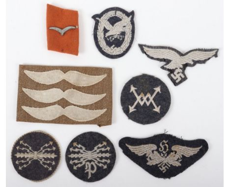 Selection of Luftwaffe Insignia, including cloth Wireless Operators qualification badge, enlisted ranks tunic breast eagle, f