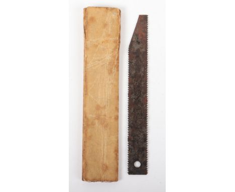 Scarce WW2 Royal Air Force Escape and Evasion Saw, being the small hacksaw blade still housed in the original paper covering.