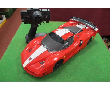 A Tamiya 1/10th Scale R/C Ferrari FXX Car with Controller, fair condition, components not checked for completeness, viewing r